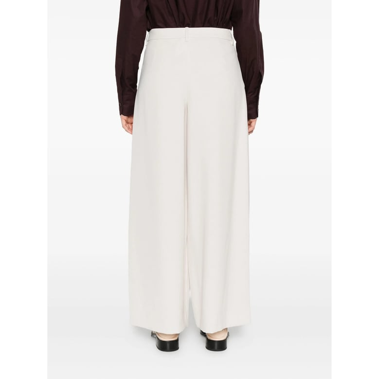 tailored trousers in light beige by Selfnex