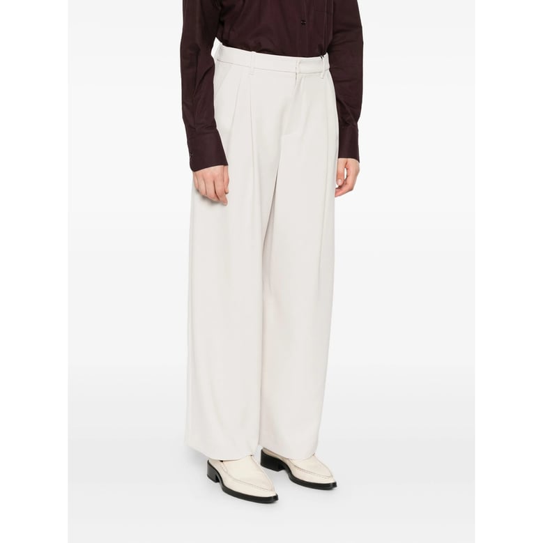 tailored trousers in light beige by Selfnex