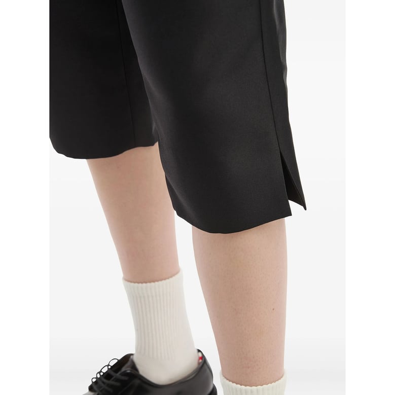 black side-slit trousers by Selfnex