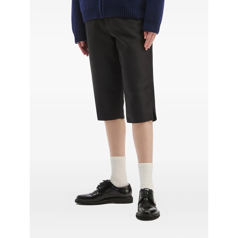 black side-slit trousers by Selfnex