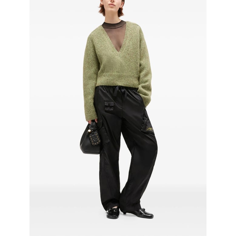 green v-neck sweater by Selfnex