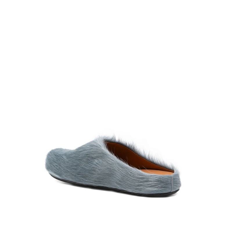 aquamarine blue slip-on shoes by Selfnex