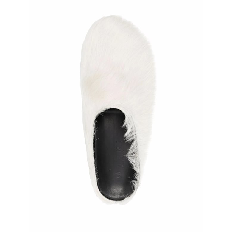 white calf hair slip-on shoes by Selfnex