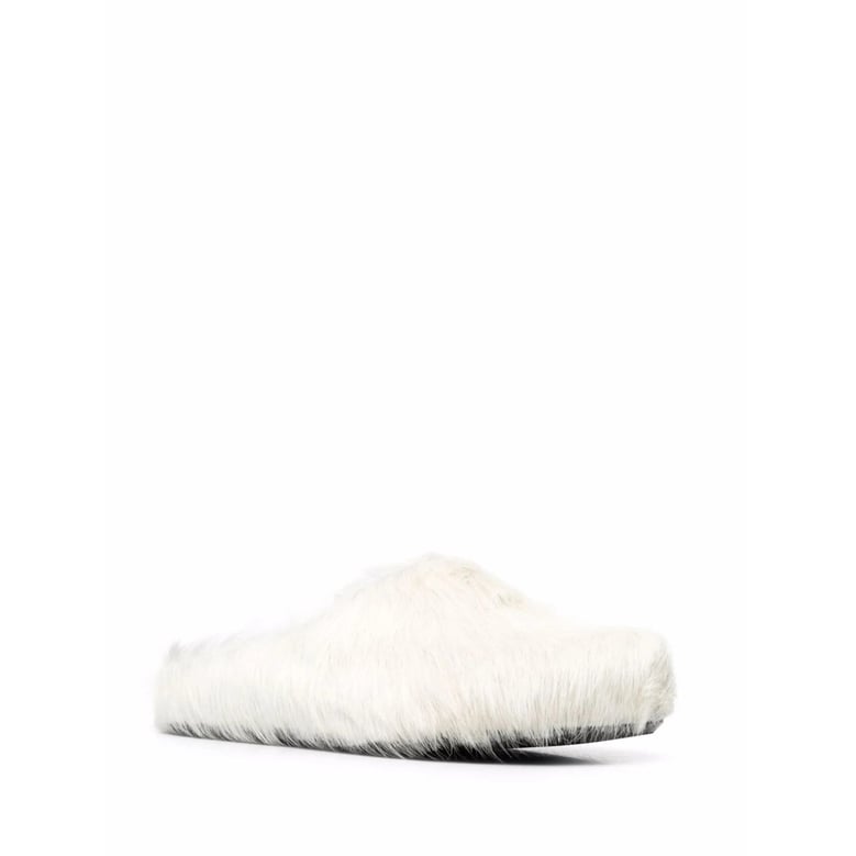 white calf hair slip-on shoes by Selfnex