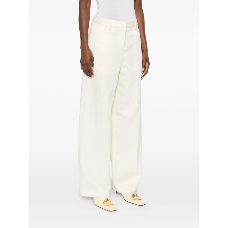 light cream wide leg trousers by Selfnex