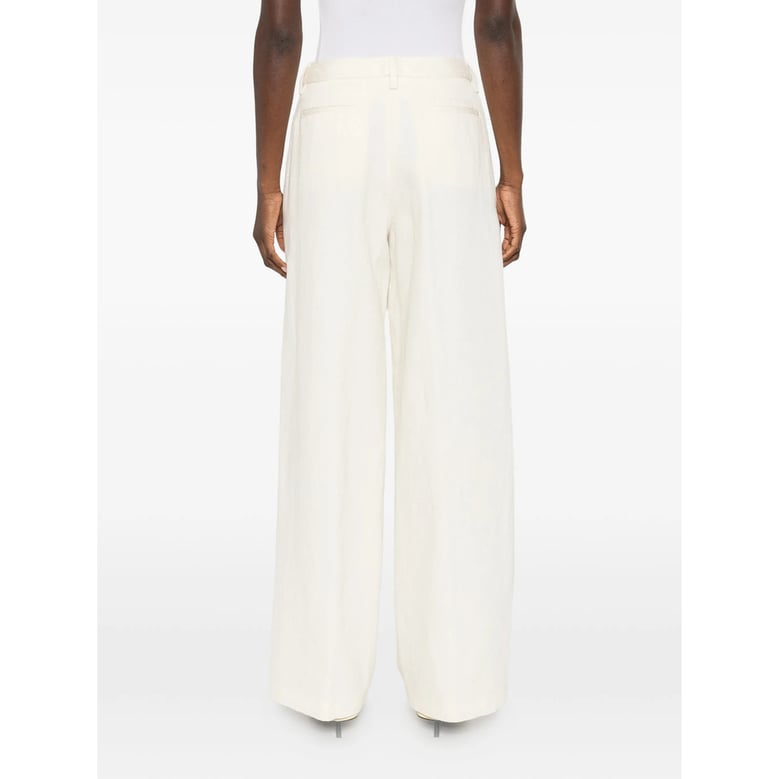 light cream wide leg trousers by Selfnex