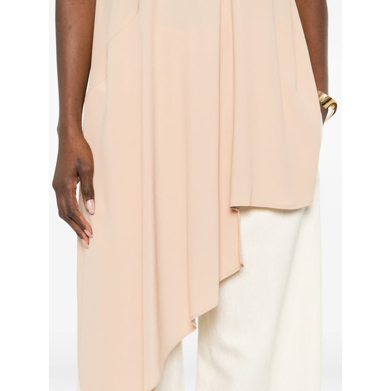 beige asymmetric hem sleeveless top by Selfnex