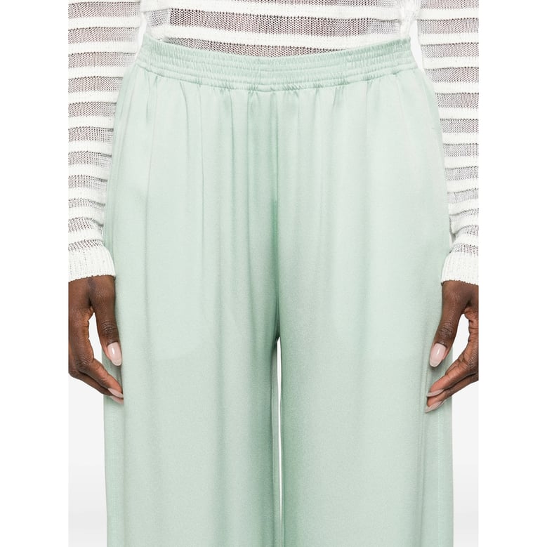wide leg trousers with elasticated waistband by Selfnex