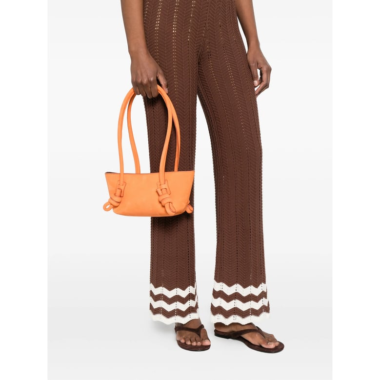 orange top handle knot detail bag by Selfnex