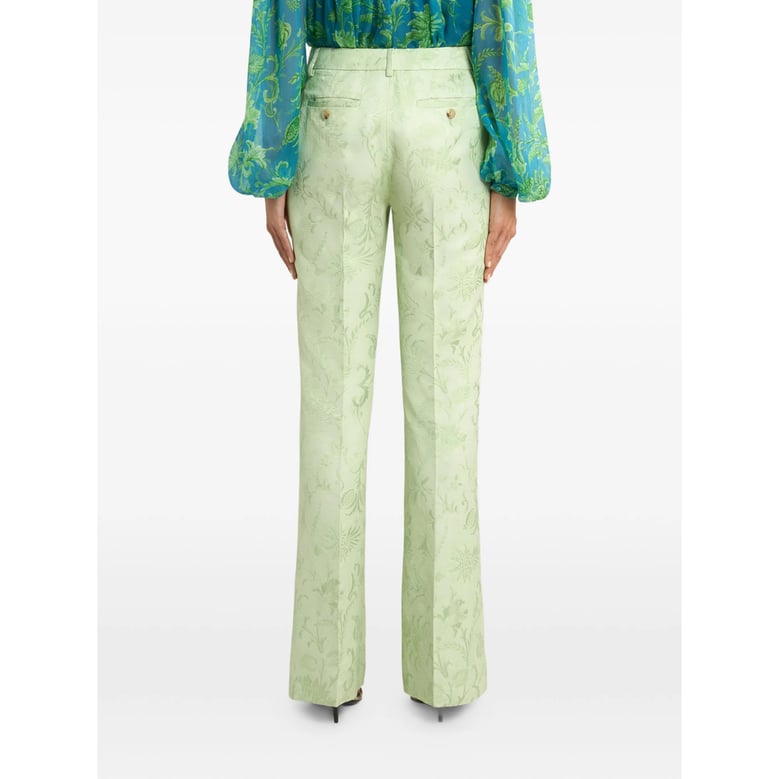 light green floral motif trousers by Selfnex