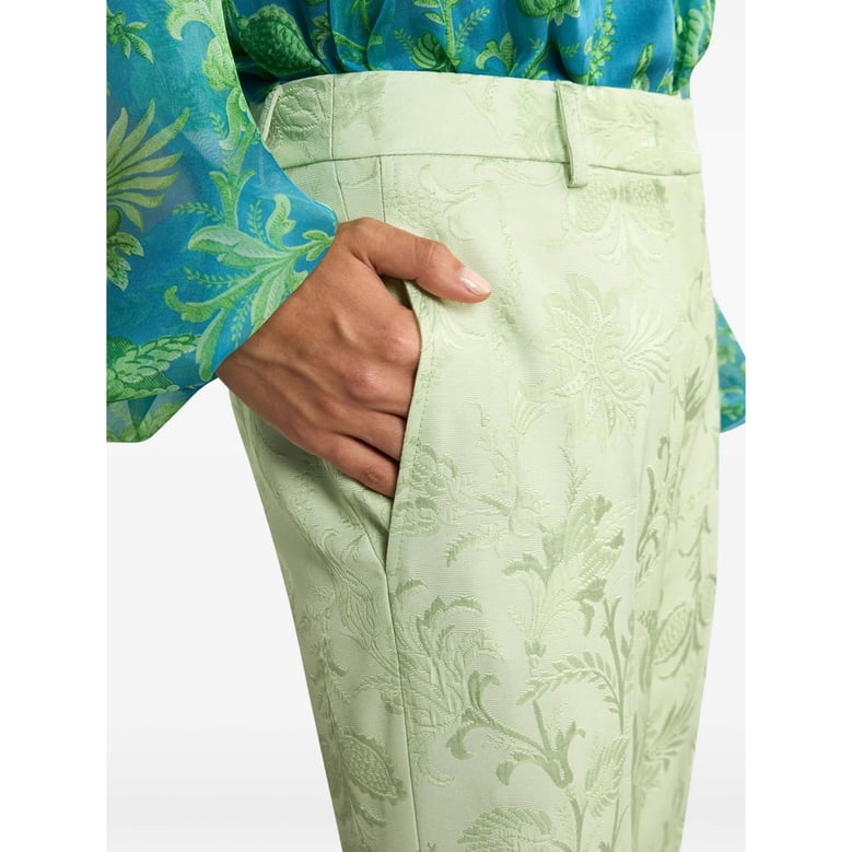 light green floral motif trousers by Selfnex