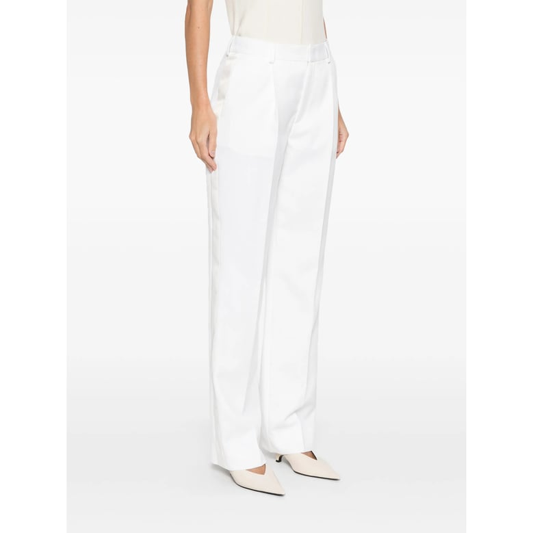 ivory panel detail straight leg pants by Selfnex