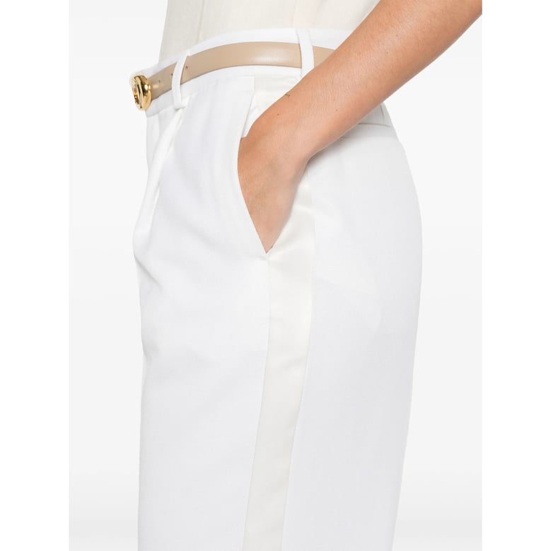 ivory panel detail straight leg pants by Selfnex