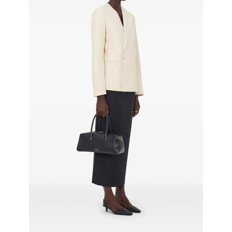 leather outerwear with asymmetrical lapel by Selfnex