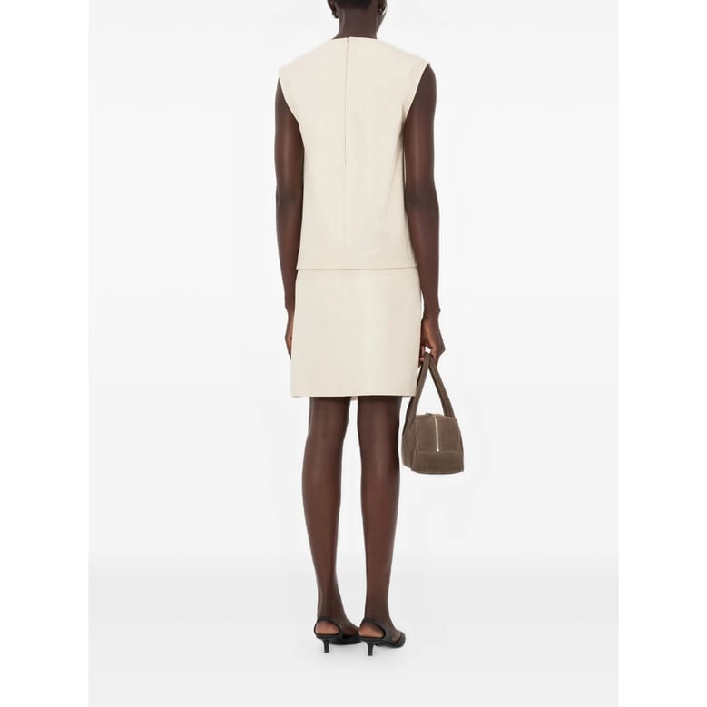 beige leather sleeveless top by Selfnex