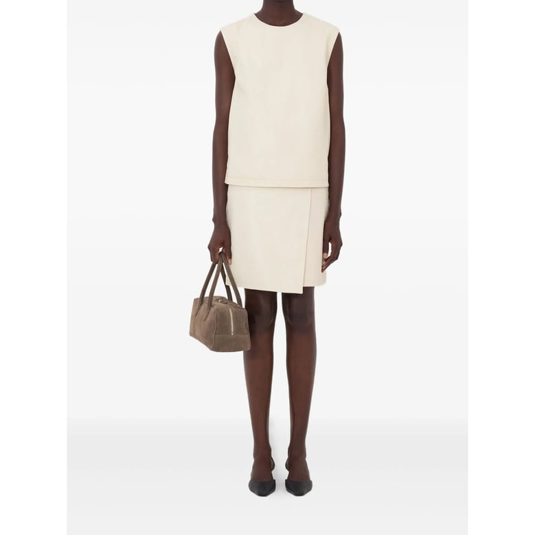 beige leather sleeveless top by Selfnex
