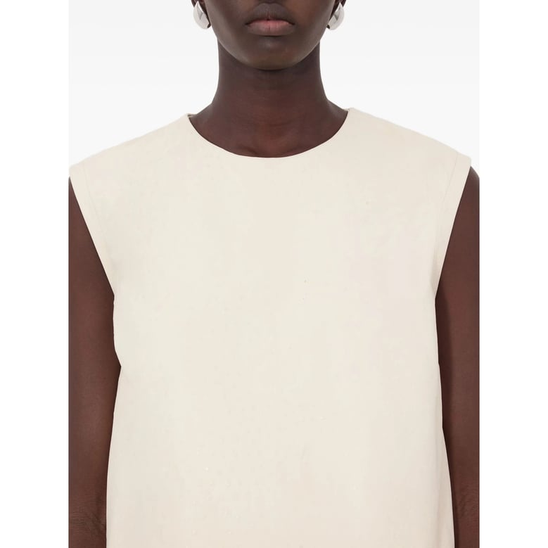 beige leather sleeveless top by Selfnex