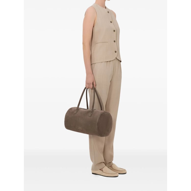 beige front buttoning jacket by Selfnex