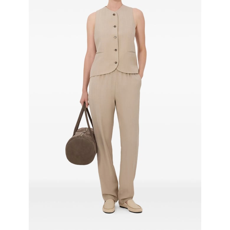 beige front buttoning jacket by Selfnex
