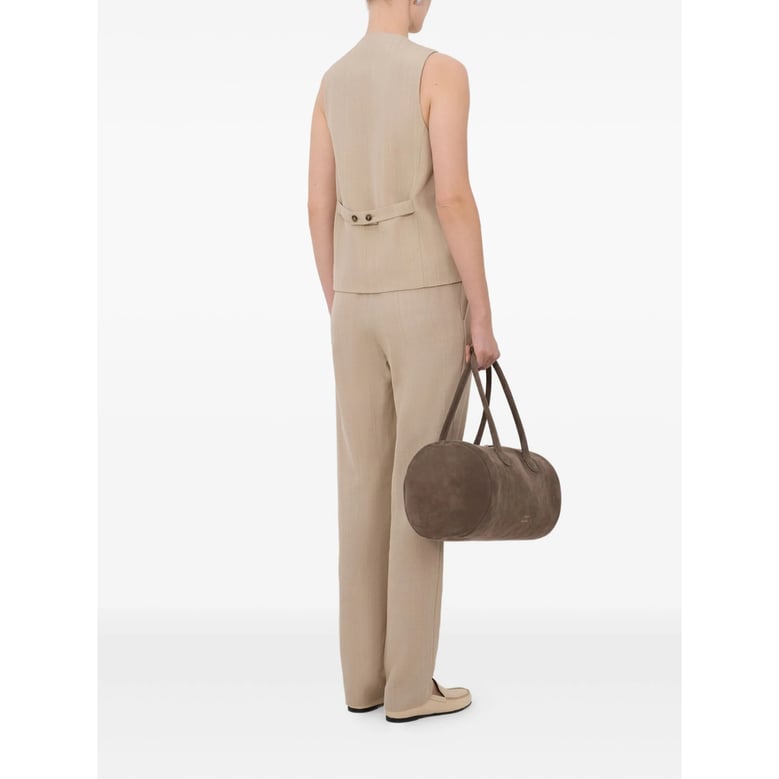 beige front buttoning jacket by Selfnex