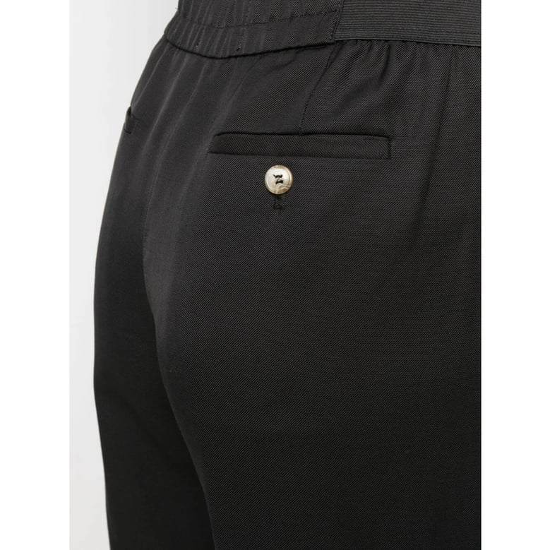 high-waisted black trousers by Selfnex