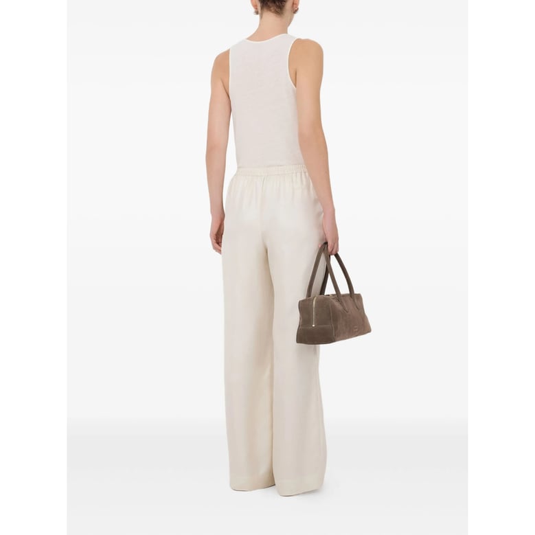 silk pant with lace-stitch detail by Selfnex