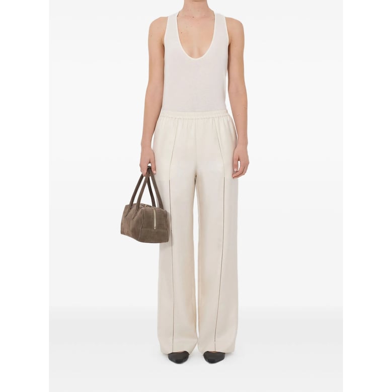 silk pant with lace-stitch detail by Selfnex