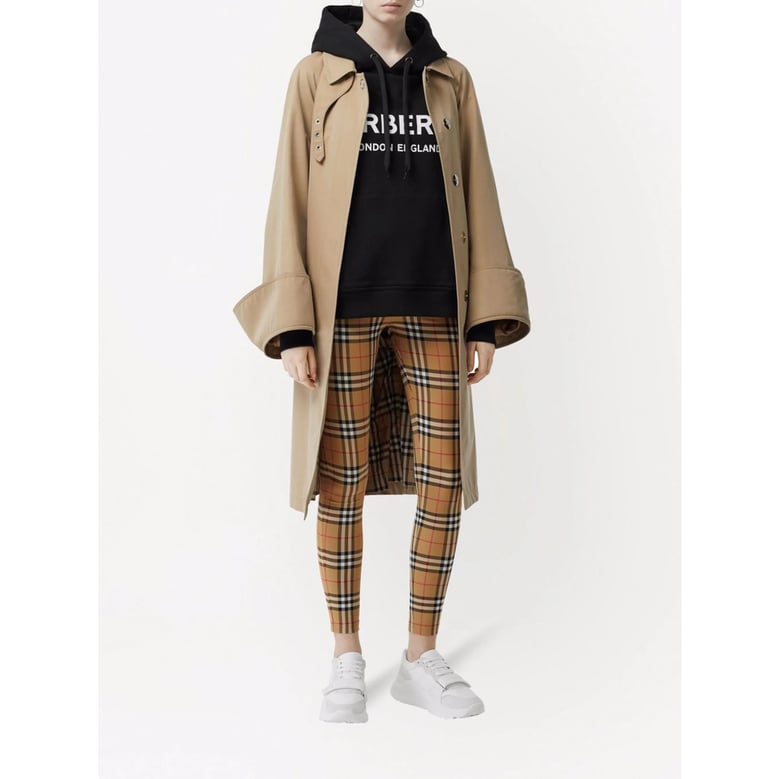 brown vintage check stretch pants by Selfnex