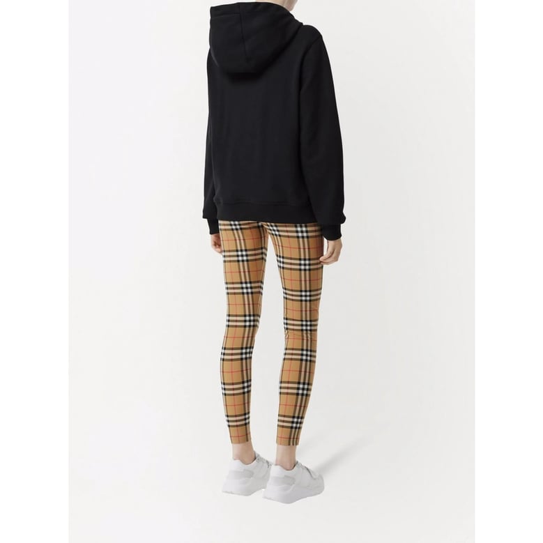 brown vintage check stretch pants by Selfnex