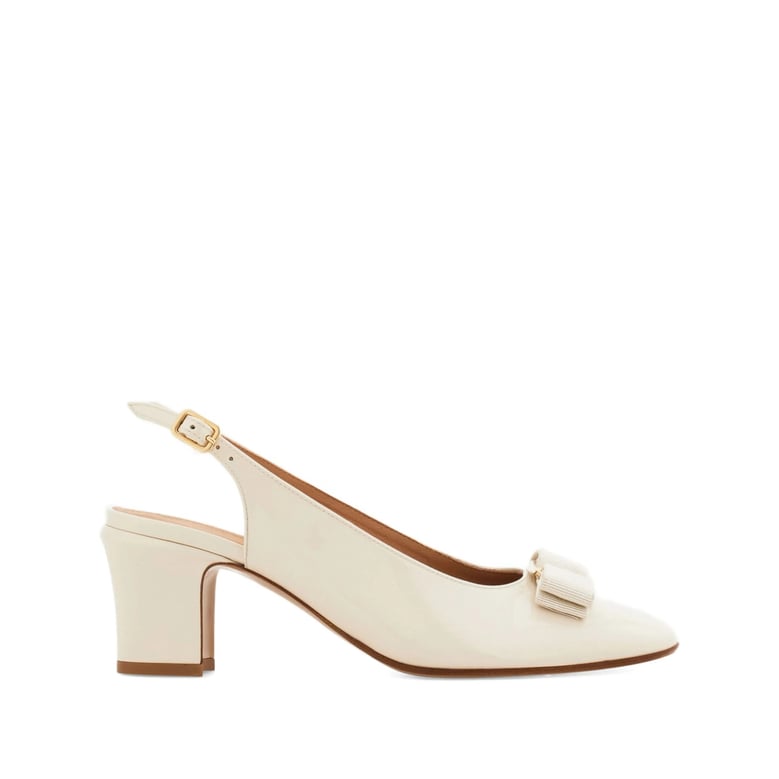 white slingback shoes with bow detail by Selfnex