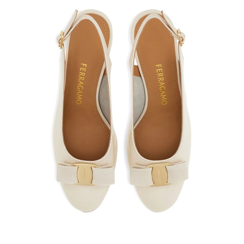 white slingback shoes with bow detail by Selfnex