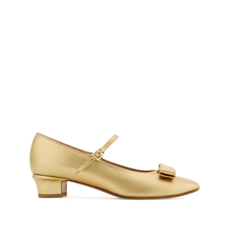 gold-tone laminated bow detail shoes by Selfnex