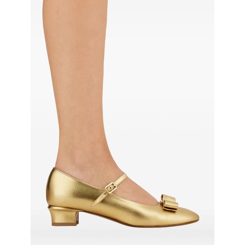 gold-tone laminated bow detail shoes by Selfnex