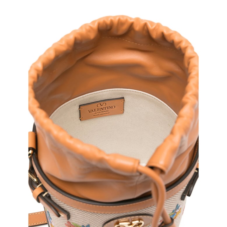 light brown floral embroidered bucket bag by Selfnex