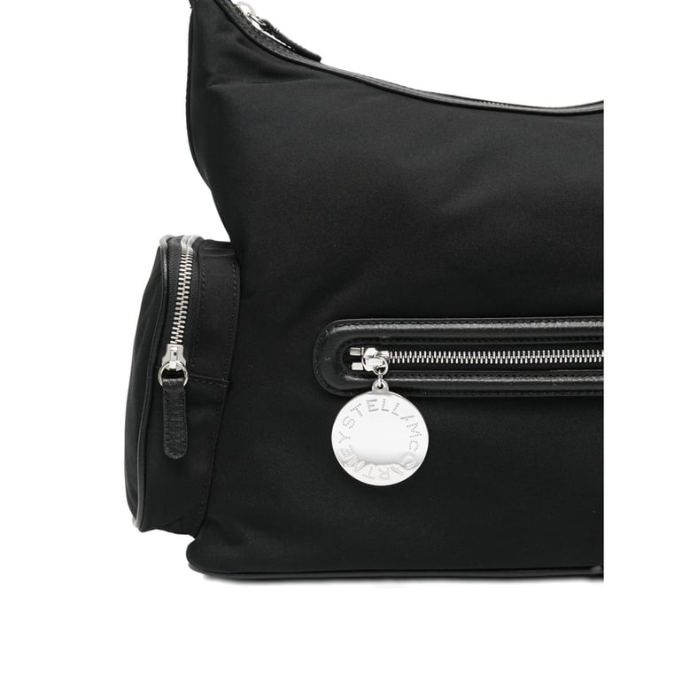 black top handle bag with zip pockets by Selfnex
