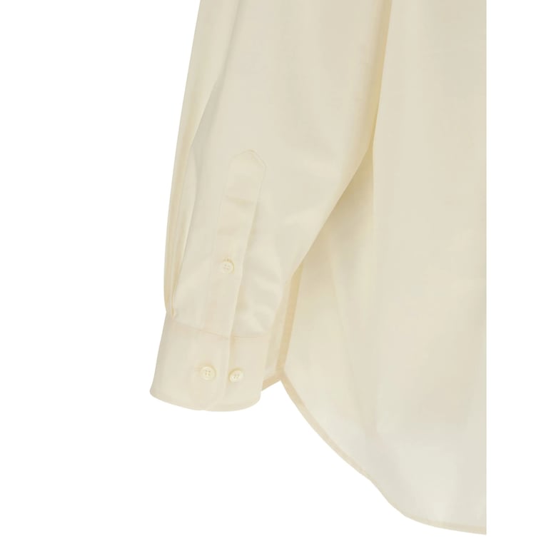 beige button-down shirt with rounded hem by Selfnex