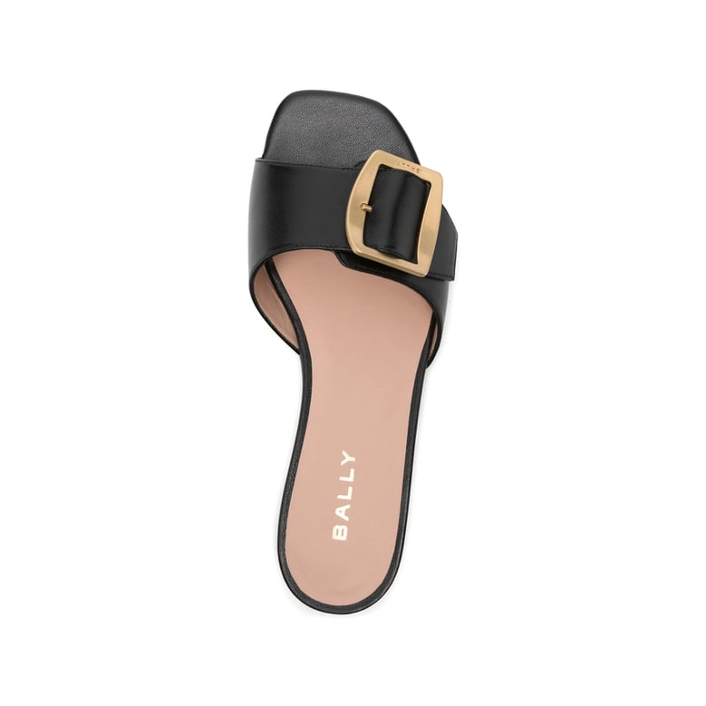 black open toe flats with gold-tone hardware by Selfnex