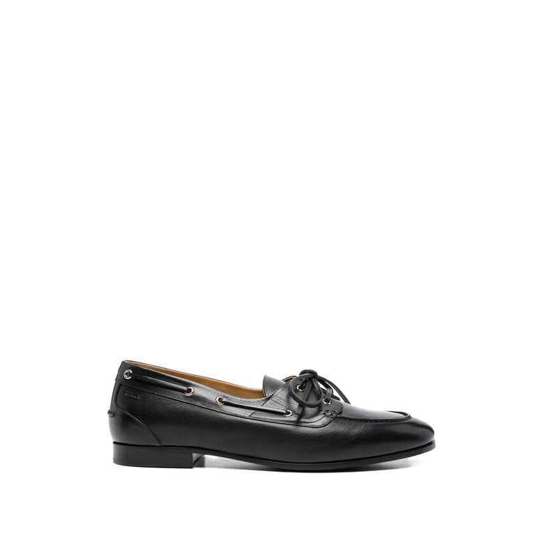 black leather loafers with gold hardware by Selfnex