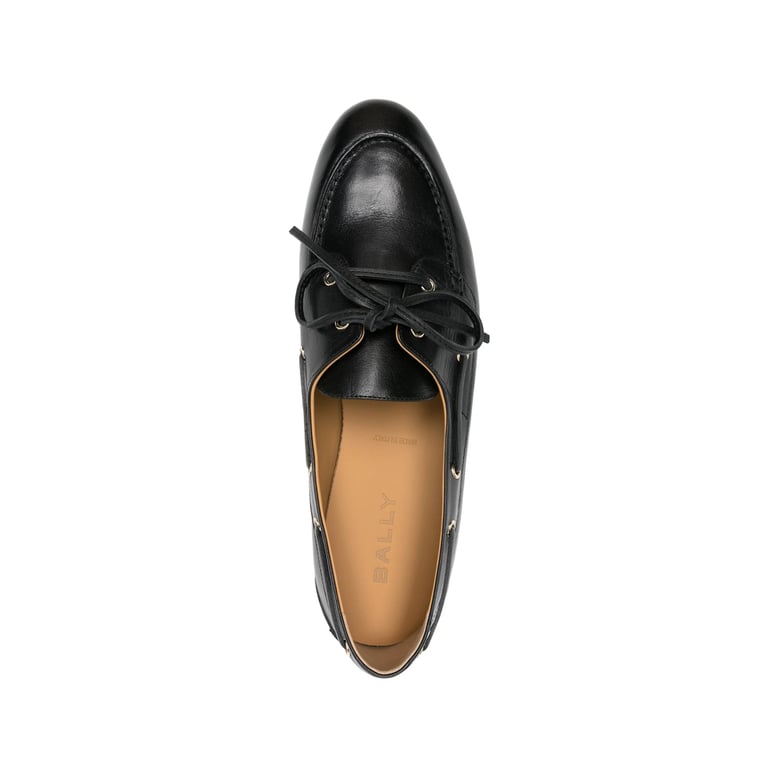 black leather loafers with gold hardware by Selfnex
