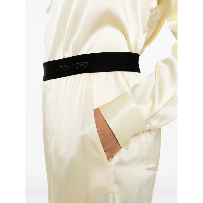 yellow and black straight leg pants by Selfnex