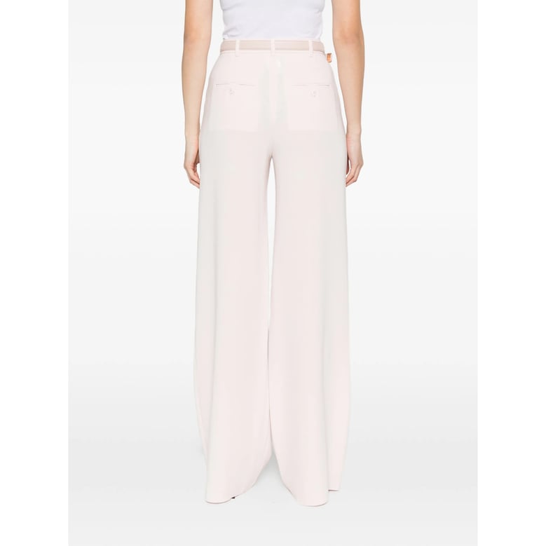 pink belted straight leg trousers by Selfnex