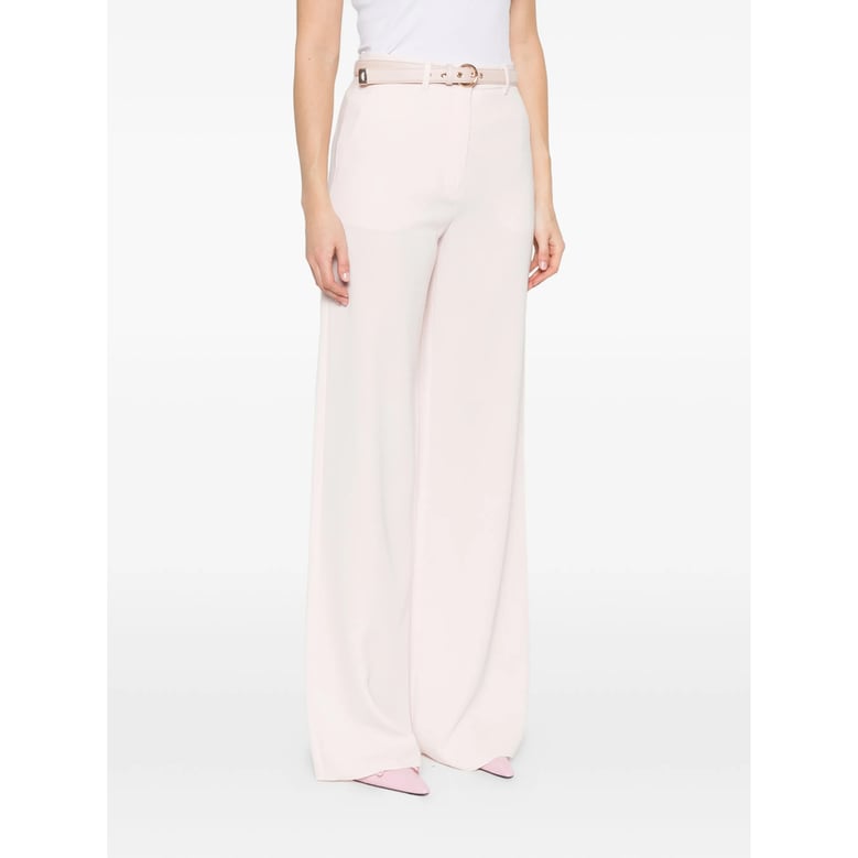 pink belted straight leg trousers by Selfnex