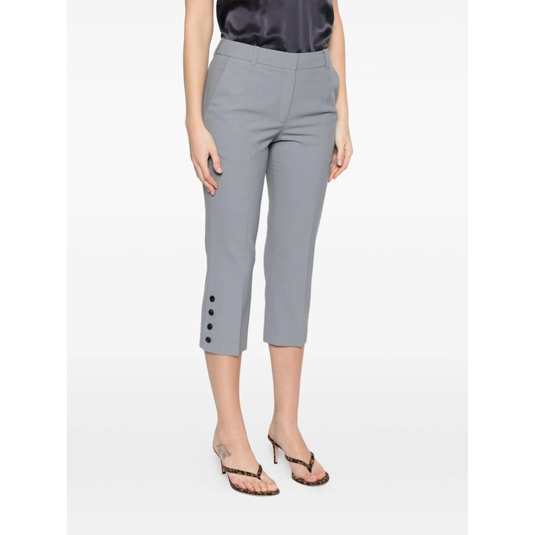 cropped trousers with button details by Selfnex