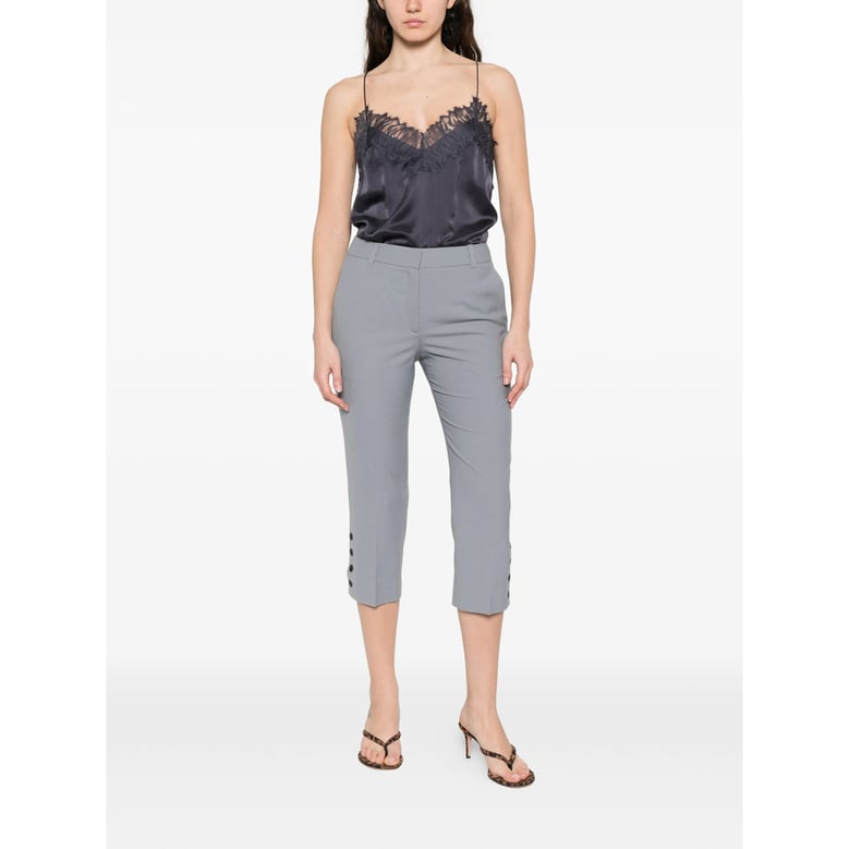 cropped trousers with button details by Selfnex