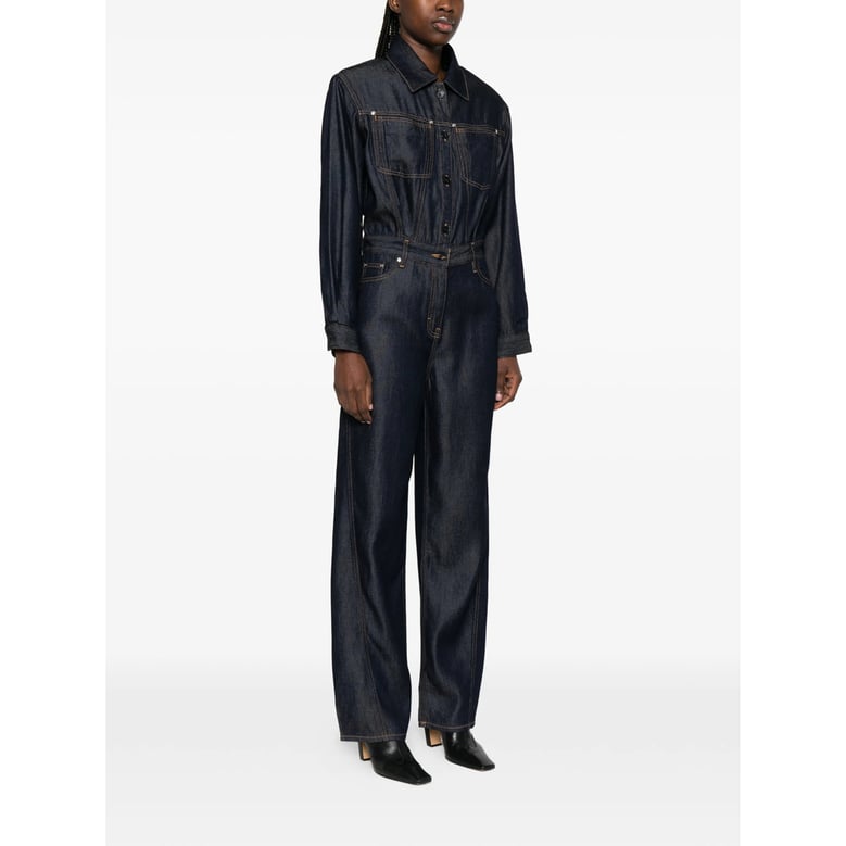 indigo blue jumpsuit with front pockets by Selfnex