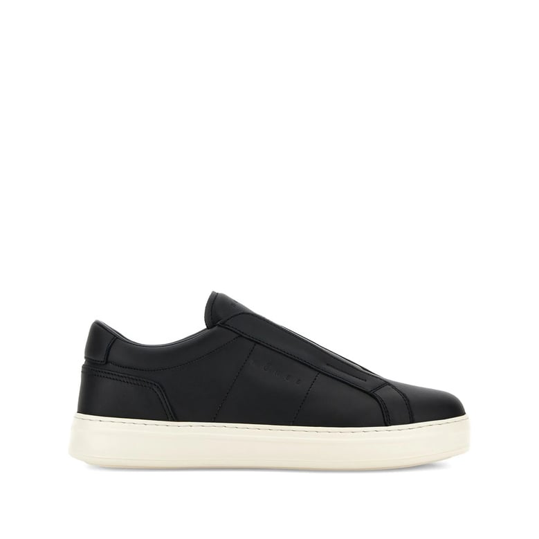 black slip-on sneakers with rubber sole by Selfnex