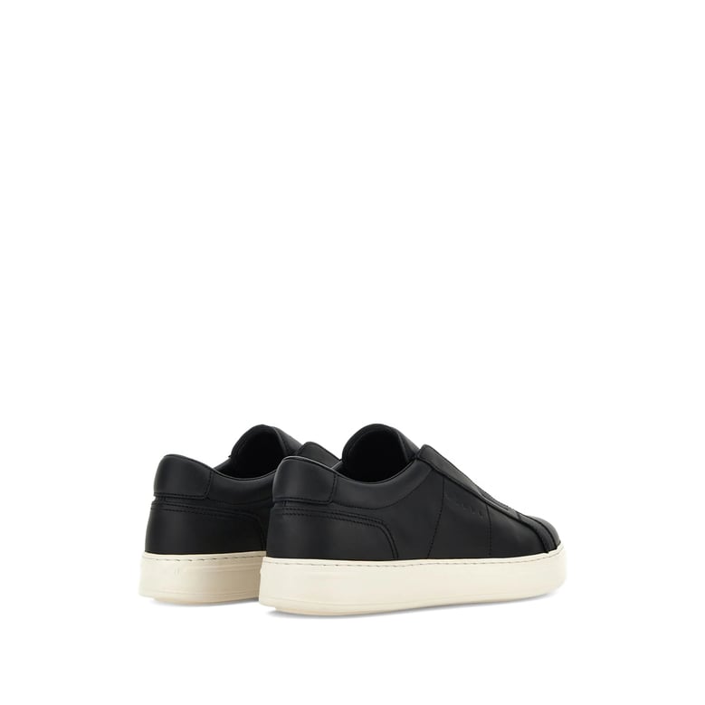 black slip-on sneakers with rubber sole by Selfnex