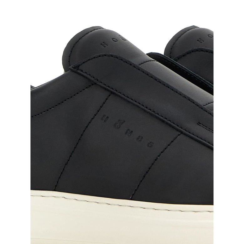 black slip-on sneakers with rubber sole by Selfnex