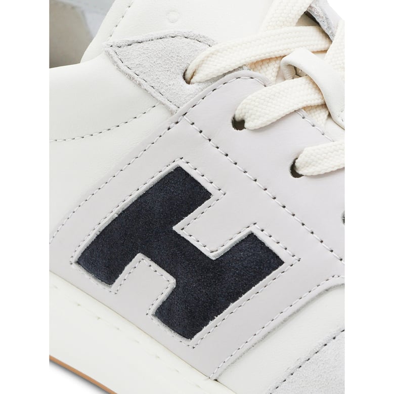sneaker with suede panels and logo by Selfnex