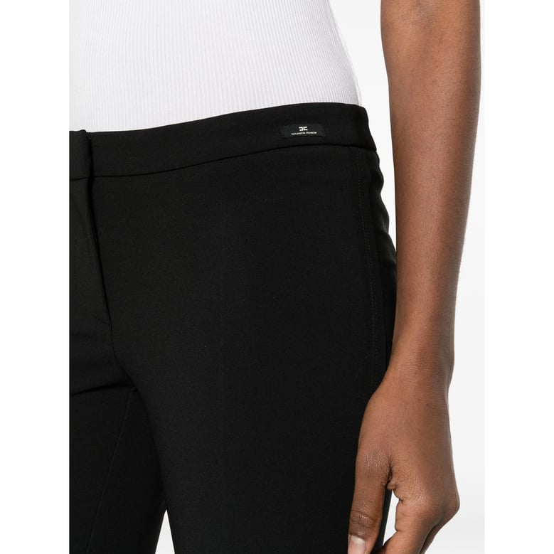 flared leg trousers with concealed fastening by Selfnex